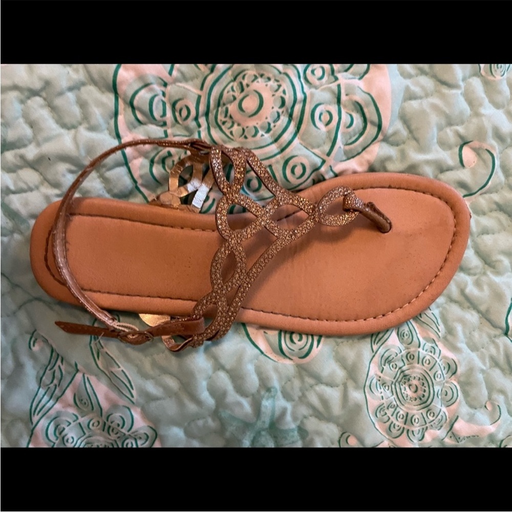gold colored sandals!
